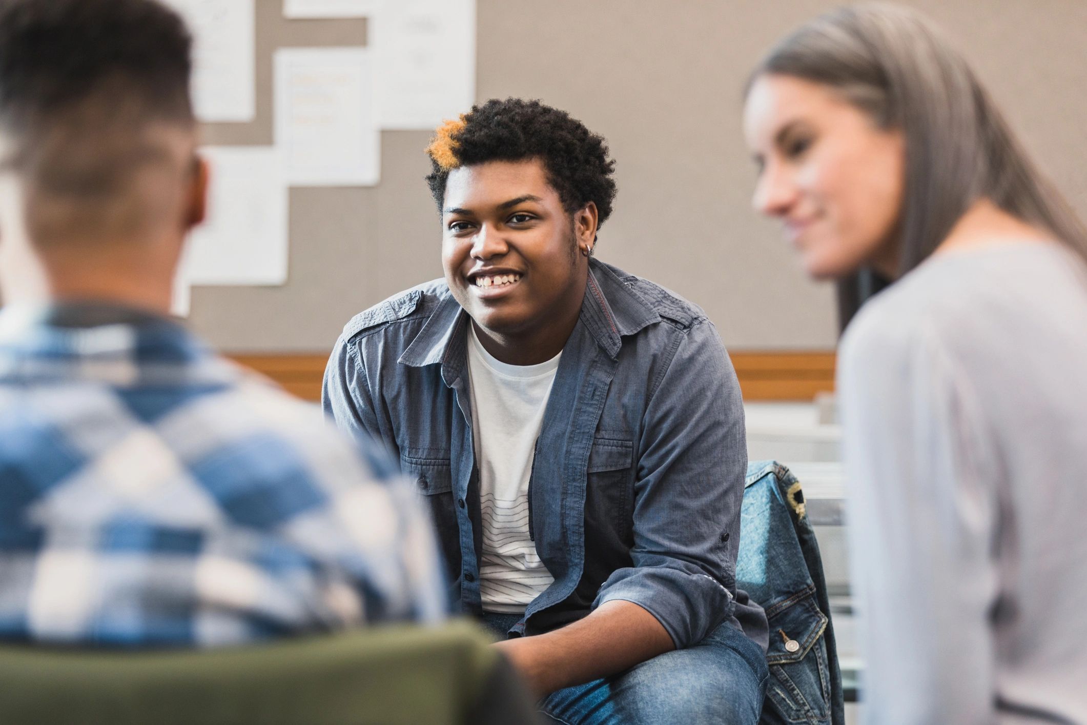 Teen receiving supportive guidance in a counseling setting