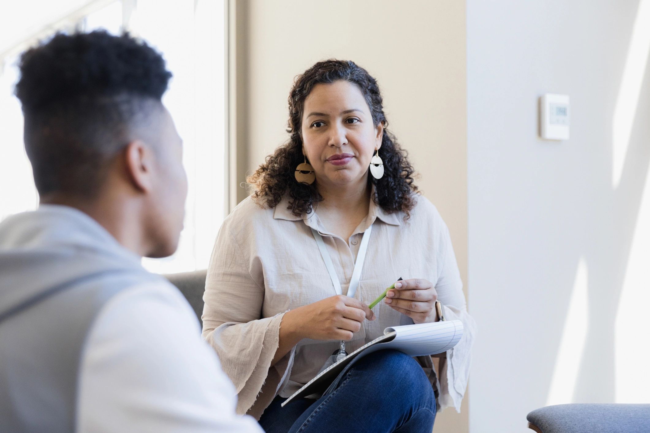 Therapist listening attentively during a counseling session